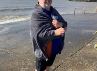 Carmarthenshire chair’s charity dip at Pendine