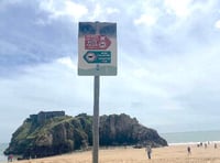 Beach signs are 'not visible enough'