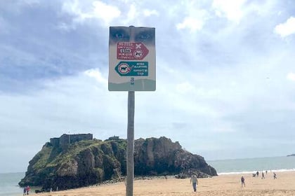 Beach signs are 'not visible enough'