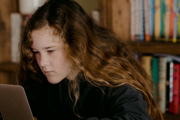 Young person at laptop