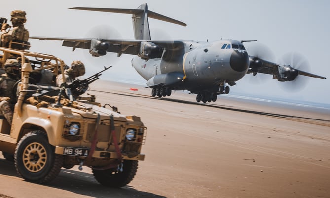 See SWNS story SWNAbeach. How's this for a day at the beach? Huge military transport planes have been spotted landing on Pembrey Sands in West Wales. The RAF Atlas A400Ms have been carrying out beach landing training at the coastal spot this week. They also practiced the insertion of so-called pathfinders, specialised soldiers dropped into place in order to set up and operate drop zones. Incredible pictures show the crews of the Brize Norton-based LXX and 30 Squadrons carrying out the objectives.