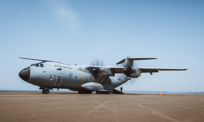 See SWNS story SWNAbeach. How's this for a day at the beach? Huge military transport planes have been spotted landing on Pembrey Sands in West Wales. The RAF Atlas A400Ms have been carrying out beach landing training at the coastal spot this week. They also practiced the insertion of so-called pathfinders, specialised soldiers dropped into place in order to set up and operate drop zones. Incredible pictures show the crews of the Brize Norton-based LXX and 30 Squadrons carrying out the objectives.